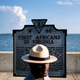 Superintendent of Fort Monroe National Monument, Terry E. Brown, poses near a historical marker at the fort, August 19, 2019, in Hampton, Virginia.